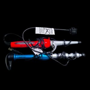2 curling irons pre owned
